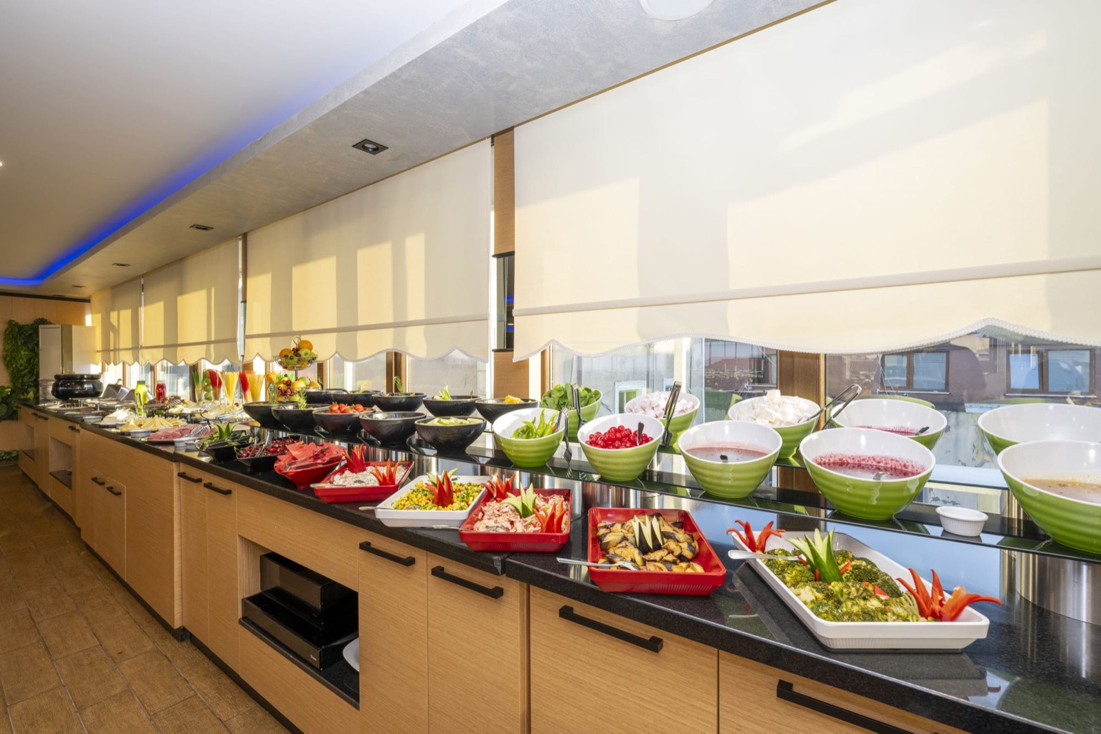 Dalan Hotel - open breakfast buffet with cheeses, olives, jams and fresh vegetables in the ground-floor salon
